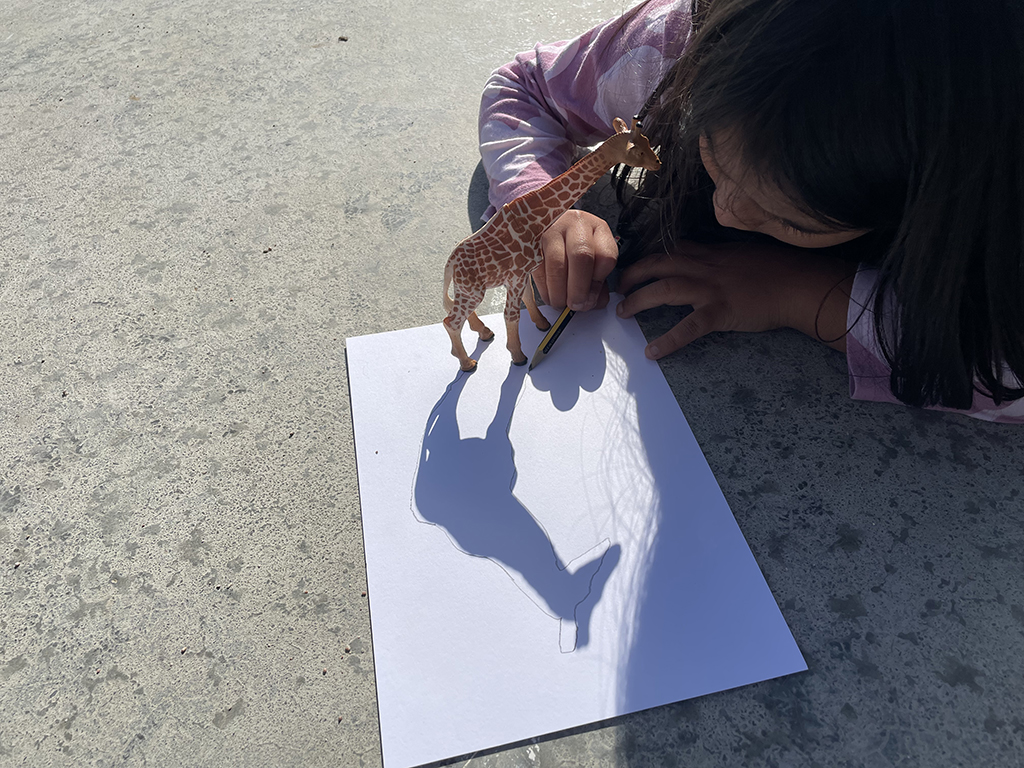 Children and adults in an art workshop